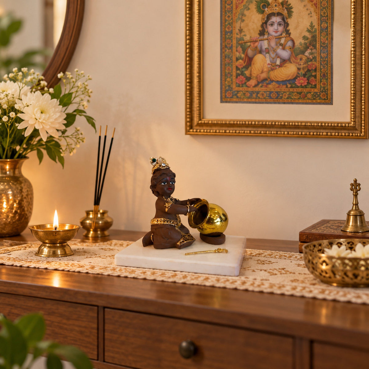 Baby Krishna Brown Figurine with Butter Pot displayed in a home setting